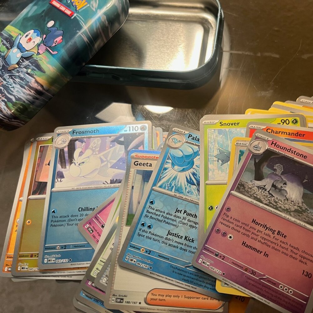 Pokemon Trading Cards 50 Cards in a Mini Tin - Normal, Reverse and Holo